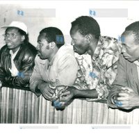 Former Nakuru North MP Koigi wa Wamwere (in cap) and six other people including a woman