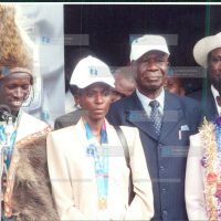 Vice-President Moody Awori with medalists Isabella Ochichi (right), Catherine Ndereba (second left) and Ezekiel Kemboi (left)