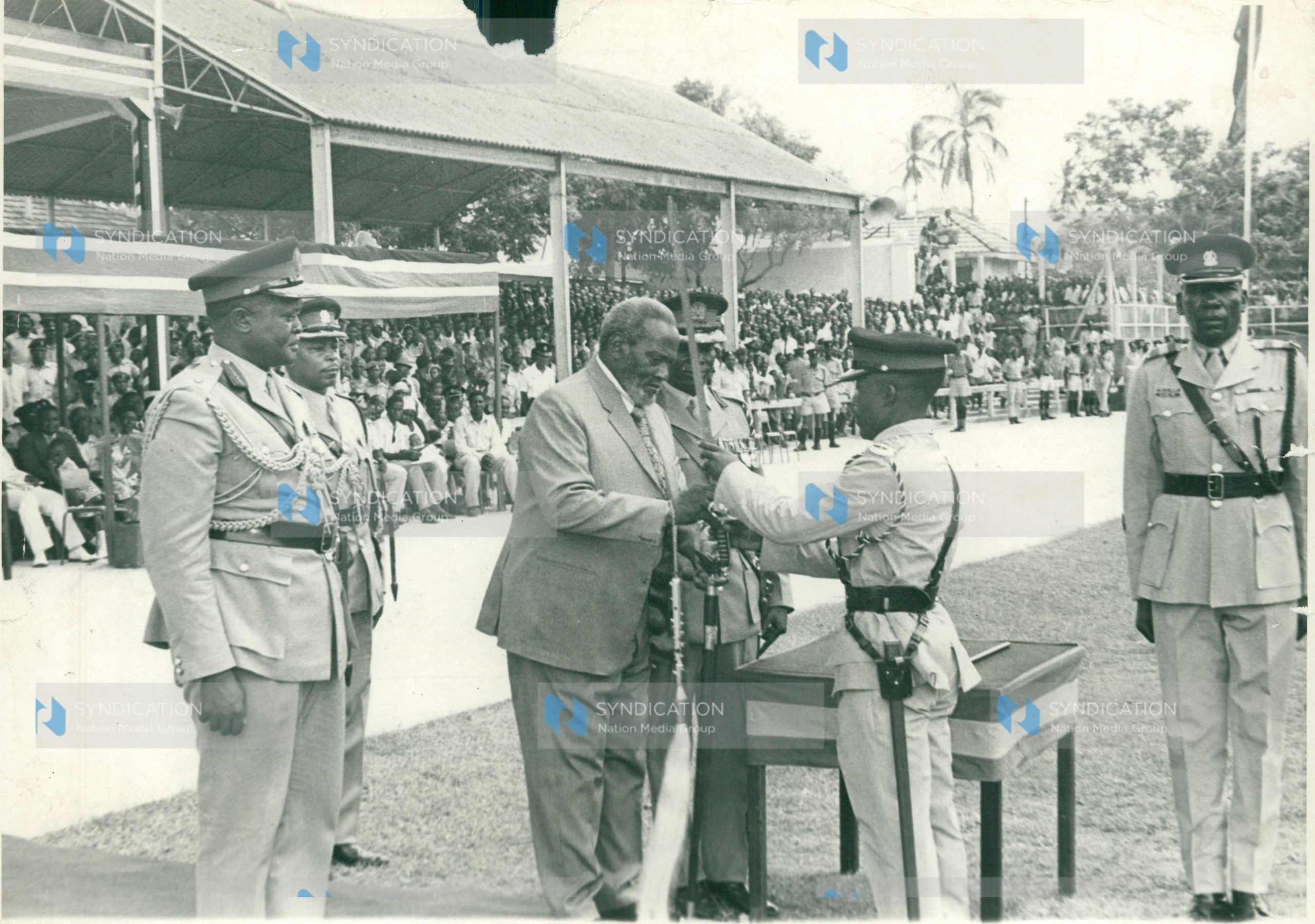 Mzee Jomo Kenyatta presents the “Sword of Honour”