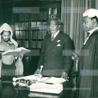 President Jomo Kenyatta (center) and Attorney-General Charles Mugane Njonjo (left). 