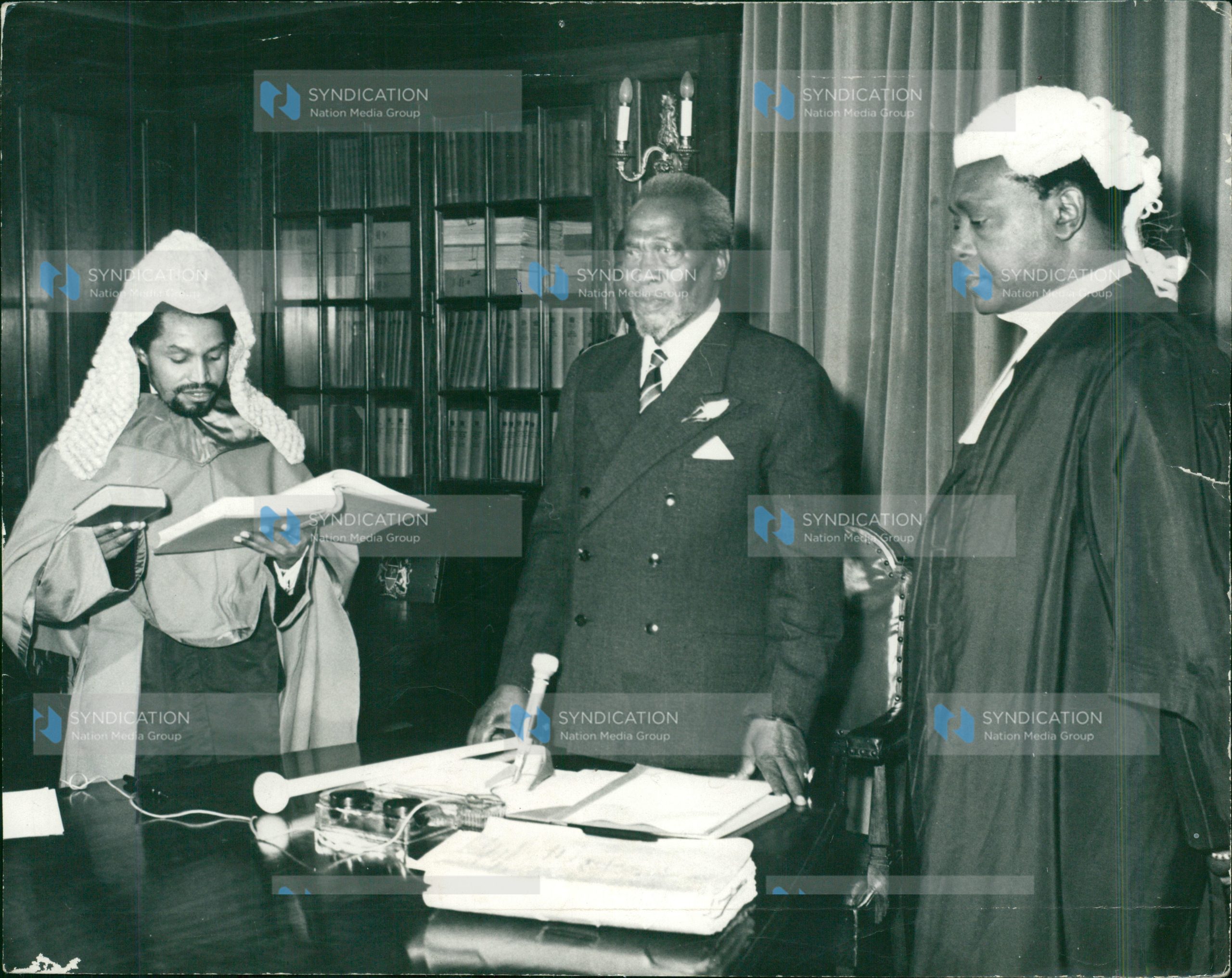 President Jomo Kenyatta (center) and Attorney-General Charles Mugane Njonjo (left). 