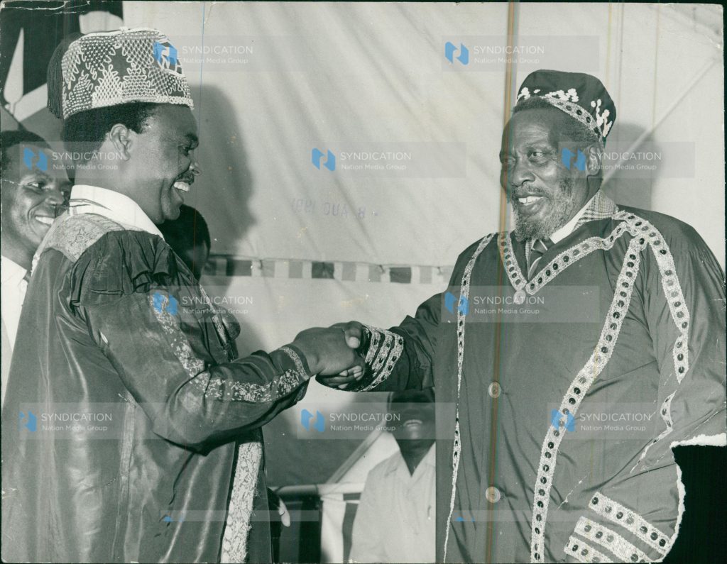 President Jomo Kenyatta (right) gowned as an Akamba Elder