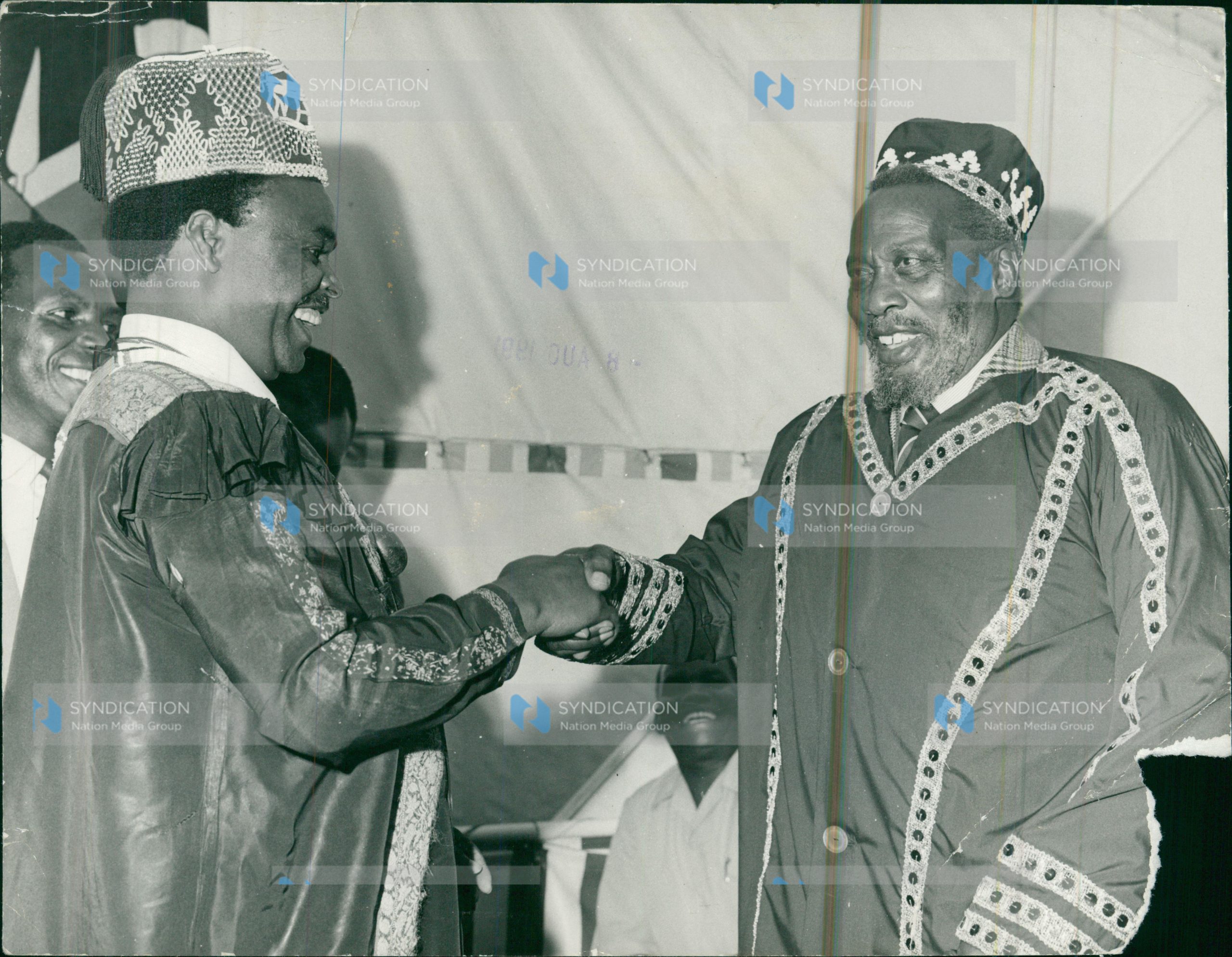 President Jomo Kenyatta (right) gowned as an Akamba Elder