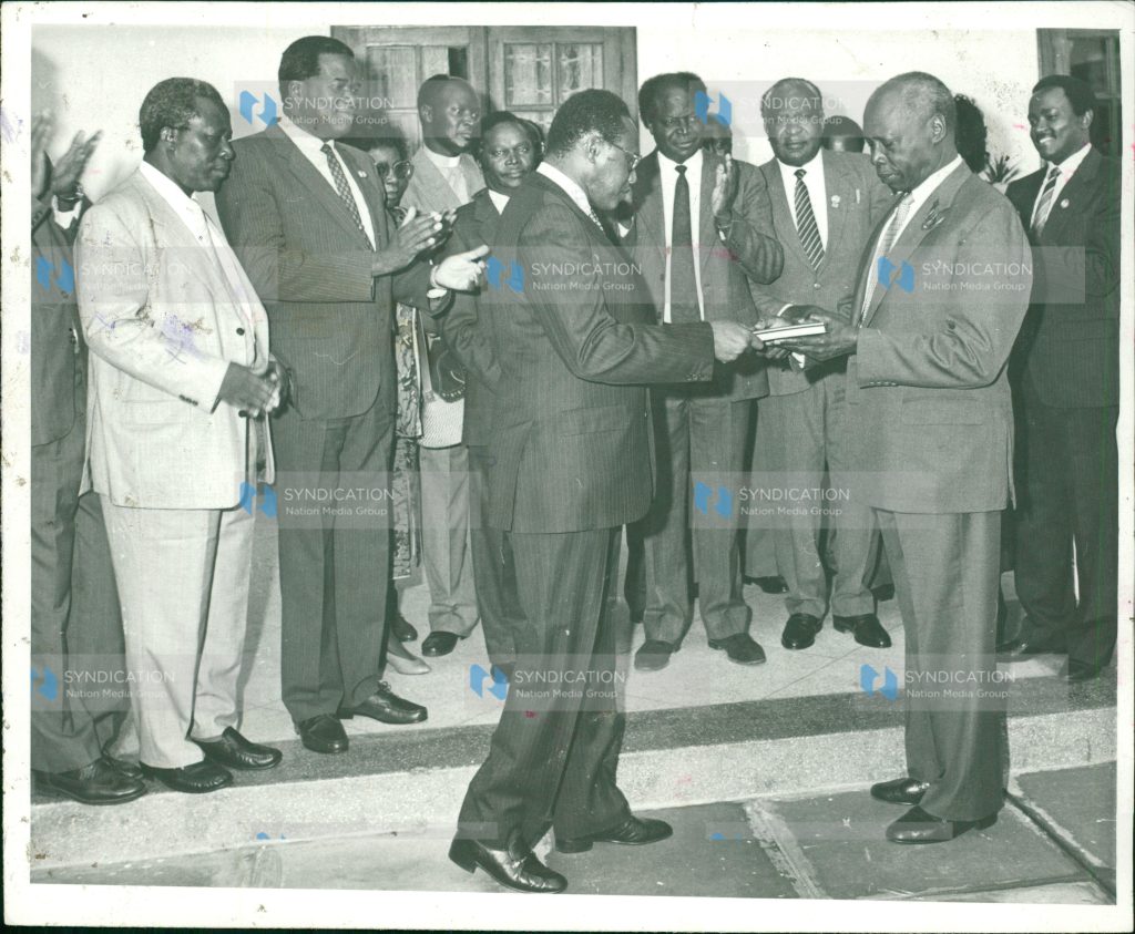 President Daniel Arap Moi receives the Kanu Review report