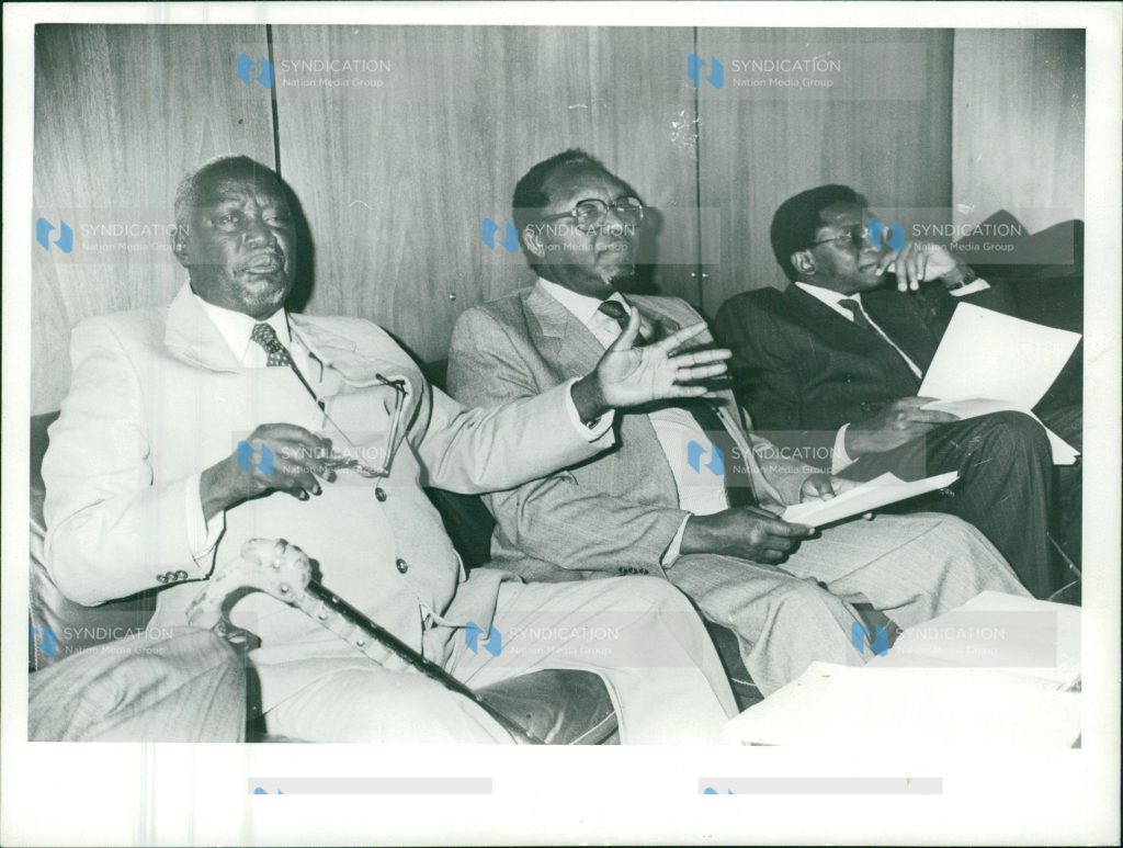 Jaramogi Oginga Odinga (left) resigns as Vice-President at a news conference in Nairobi