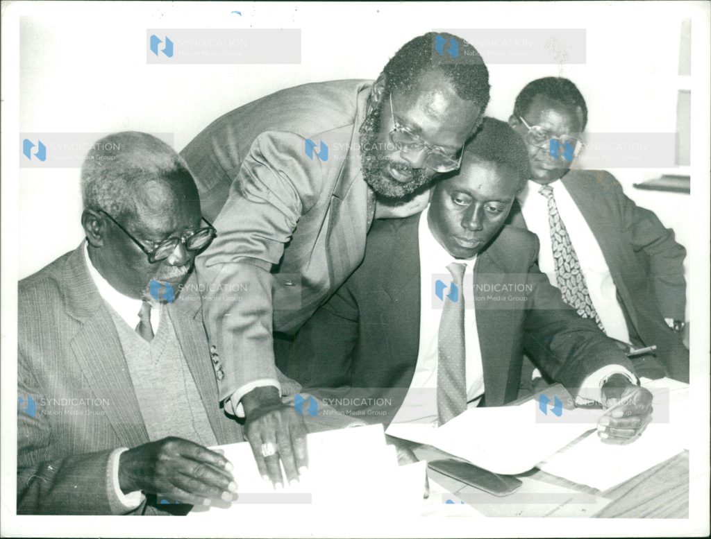 First National Vice-Chairman Paul Kibugi Muite (3rd from left) and two MPs resigns their party posts