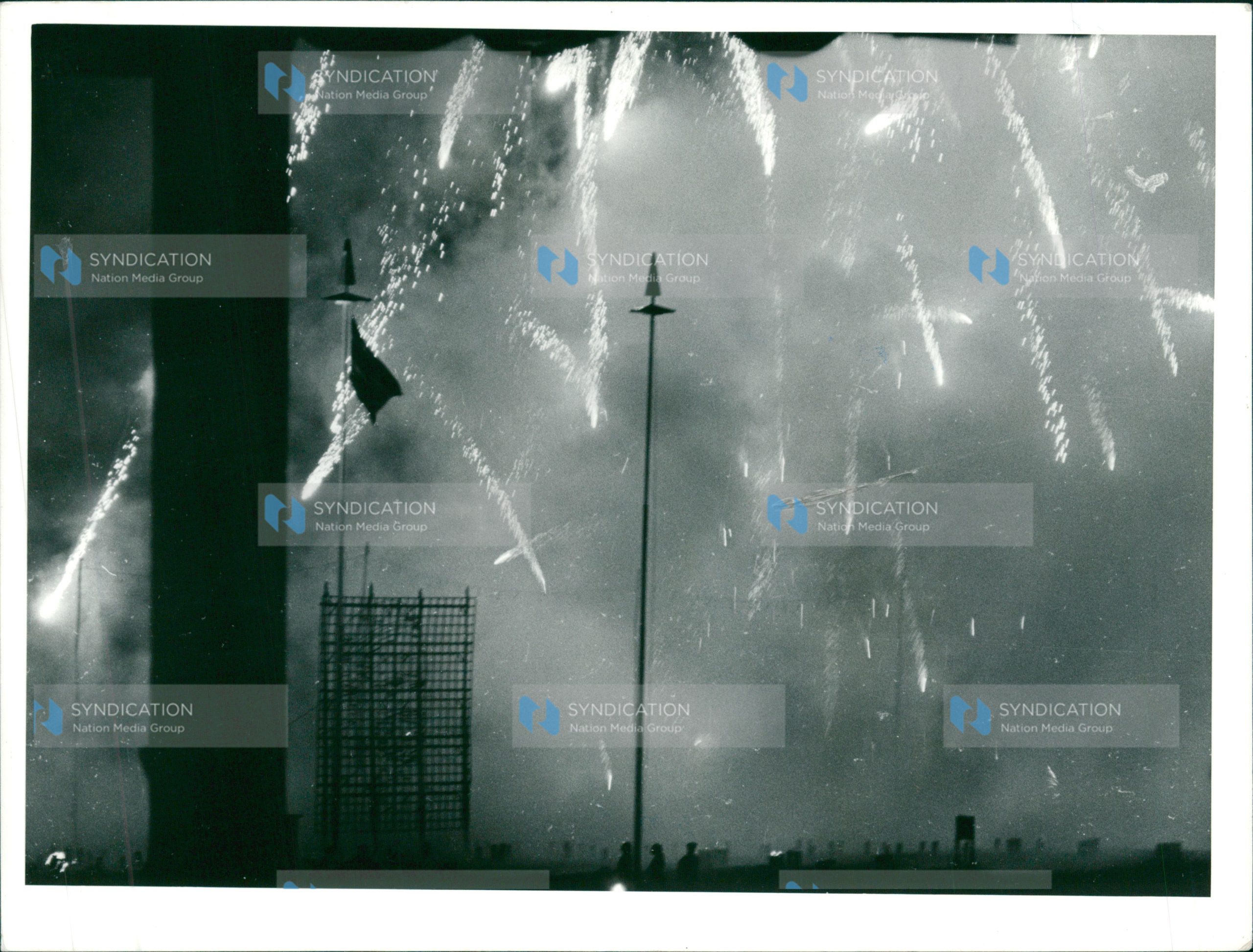 Fireworks light the sky as the Kenyan flag fly high