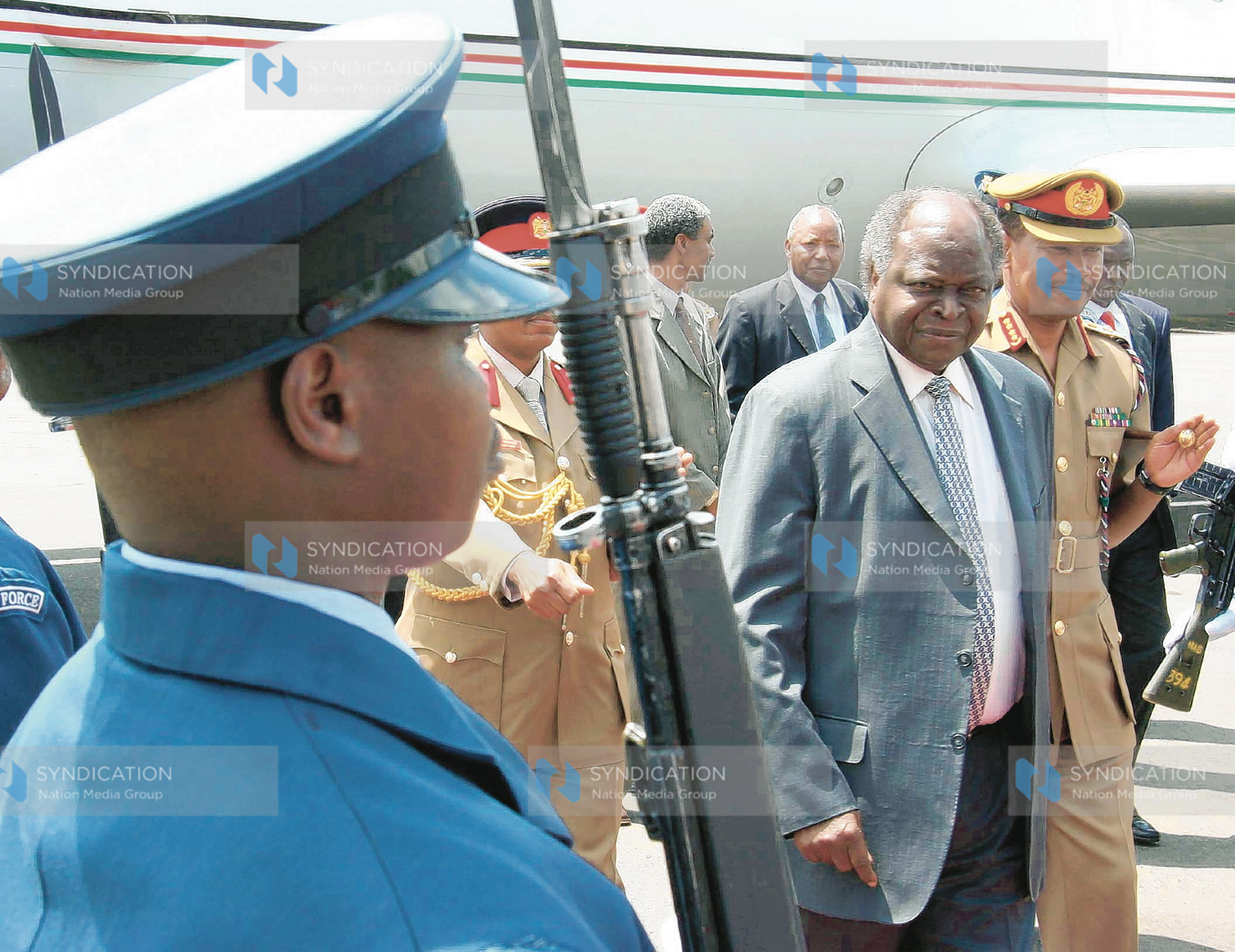 President Mwai Kibaki inspects a guard of honor