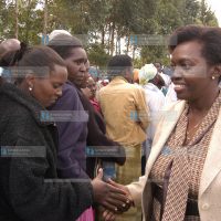 Gichugu MP Martha Karua(right) meets mourners after a prayer meeting