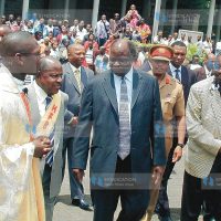 President Mwai Kibaki, Planning minister Henry Obwocha and Father Ignatius Omondi