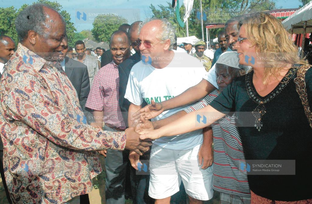 President Mwai Kibaki is bid farewell by some tourists