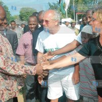 President Mwai Kibaki is bid farewell by some tourists