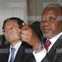 Deputy Prime Minister and Minister for Finance Uhuru Kenyatta and Zhang Ming, Chinese Ambassador