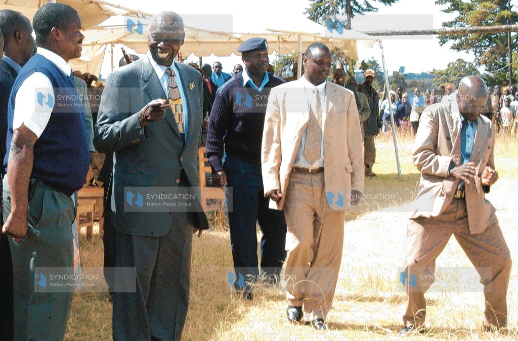 Former President Daniel Arap Moi talks to his pilot