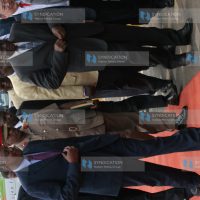 President Mwai Kibaki is met by Finance Minister Uhuru Kenyatta