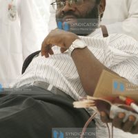 The minister for Health services, Anyang' Nyong'o donates blood