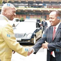 Vice President Moody Awori is received by Narc-K interim Chairman, Mr. Asman Kamama