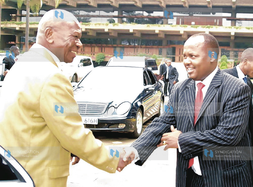 Vice President Moody Awori is received by Narc-K interim Chairman, Mr. Asman Kamama