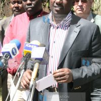 Agriculture Minister William Ruto accompanied by Timothy Busienei