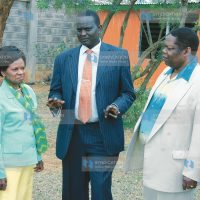 ODM-Kenya Chairman Samuel Poghishio chats with presidential candidate running-mate Dr Julia Ojiambo