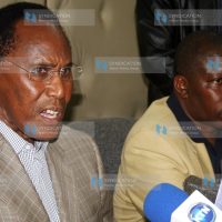 Minister for Internal security and PNU Chairman Prof, George Saitoti flanked by Former Minister of Sports Maina Kamanda