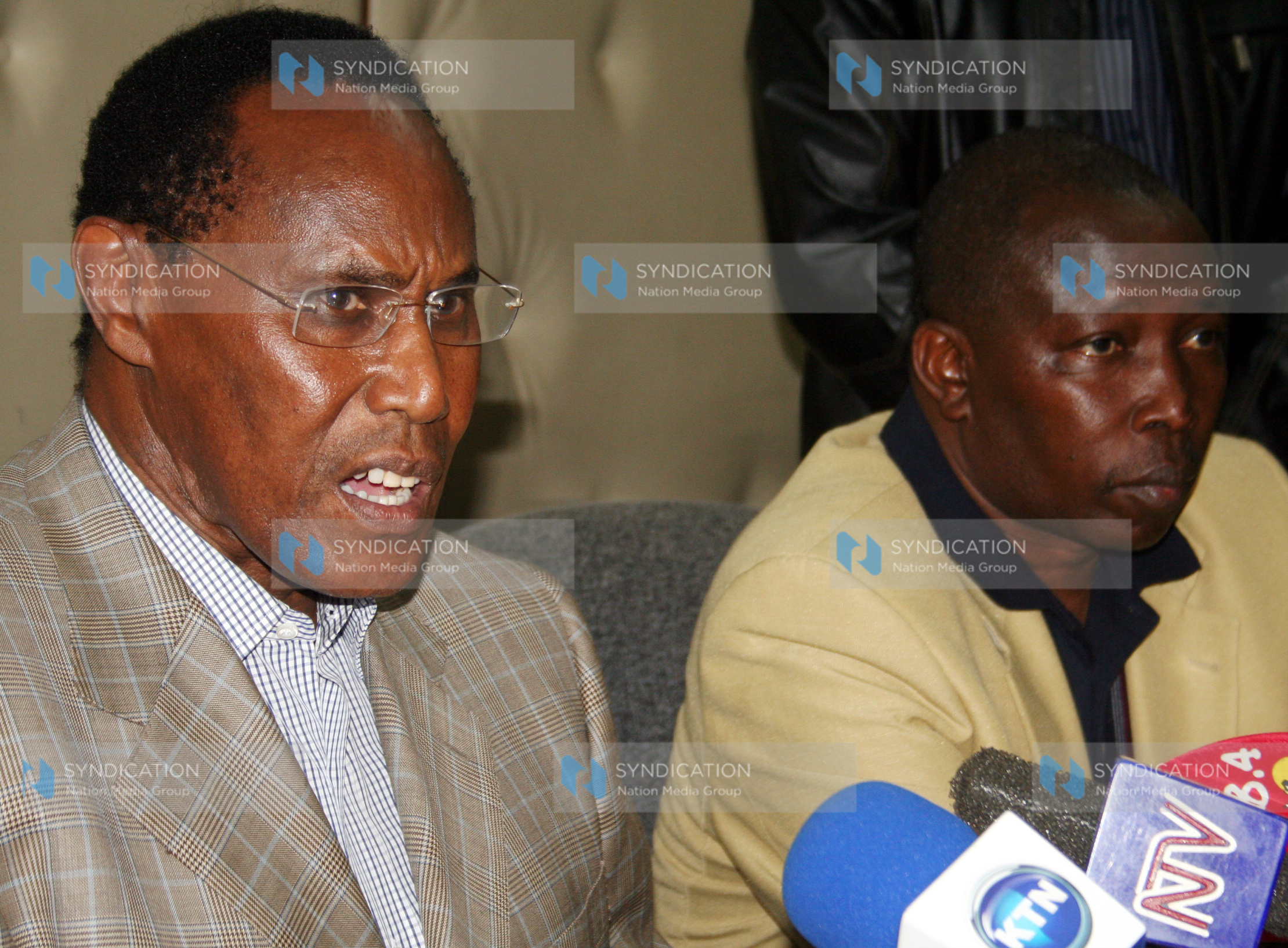 Minister for Internal security and PNU Chairman Prof, George Saitoti flanked by Former Minister of Sports Maina Kamanda