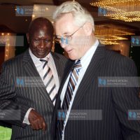 Former Vice President Dr. Moody Awori share a word with the Safaricom Foundation Chairman Mr. Les Baillie