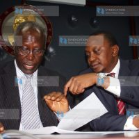 Minister for Education Prof. Sam Ongeri, flanked by Deputy Prime Minister and Minister for Finance Uhuru Kenyatta