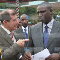 Agriculture minister William Ruto chats with the Egyptian ambassador Saher Hamza