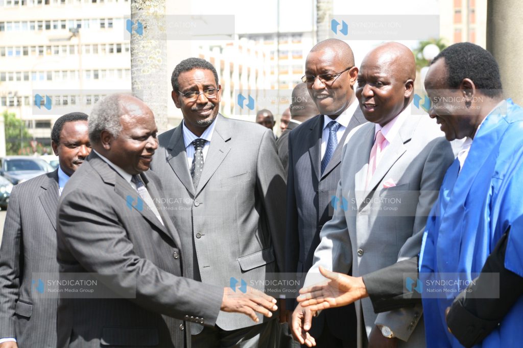 President Mwai Kibaki is welcomed at parliament buildings by Chief whips Jakoyo Midiwo, George Thuo and deputy speaker Farah Maalim