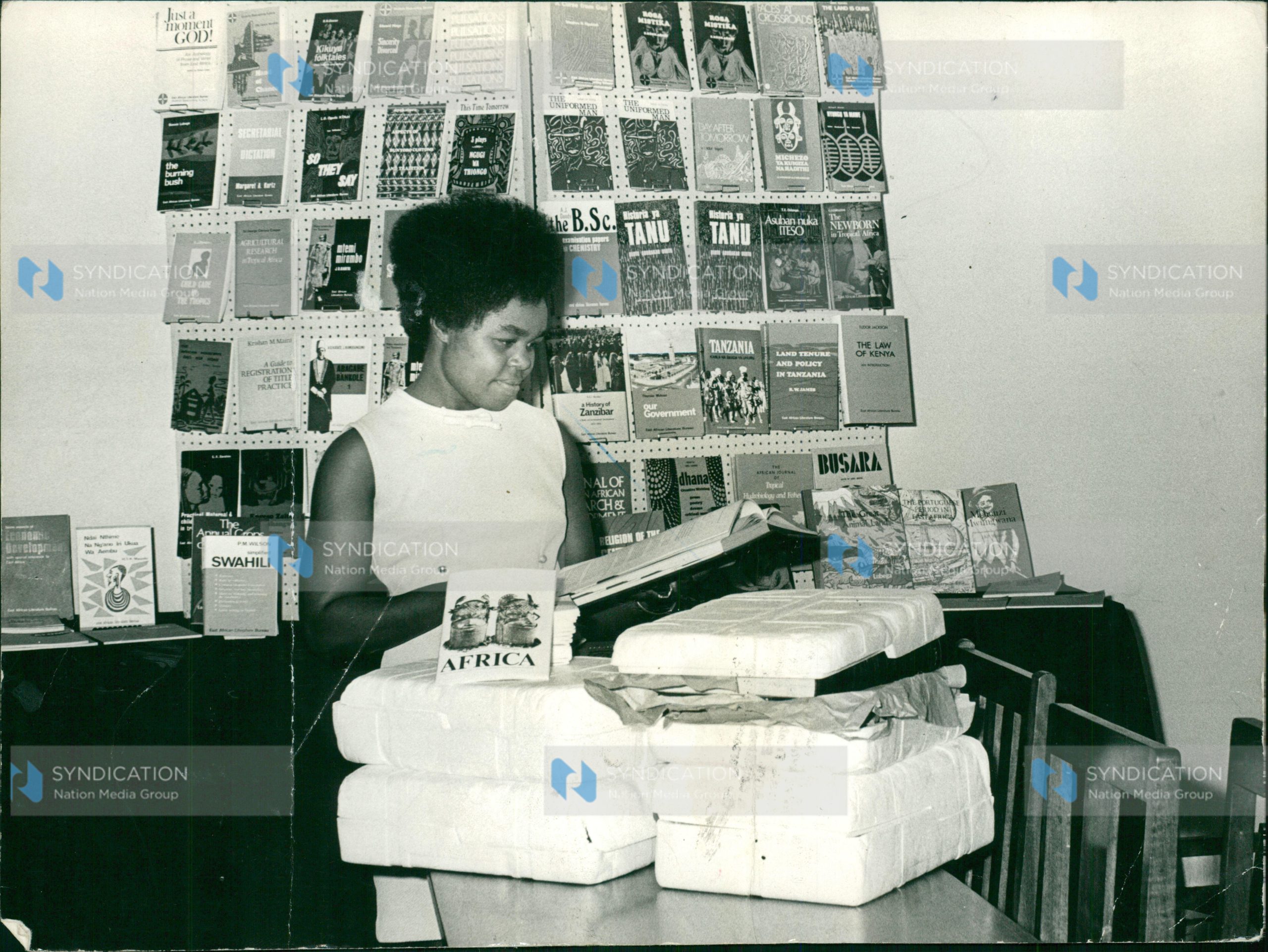 Mrs. Rose Mwangi is pictured inspecting the collection