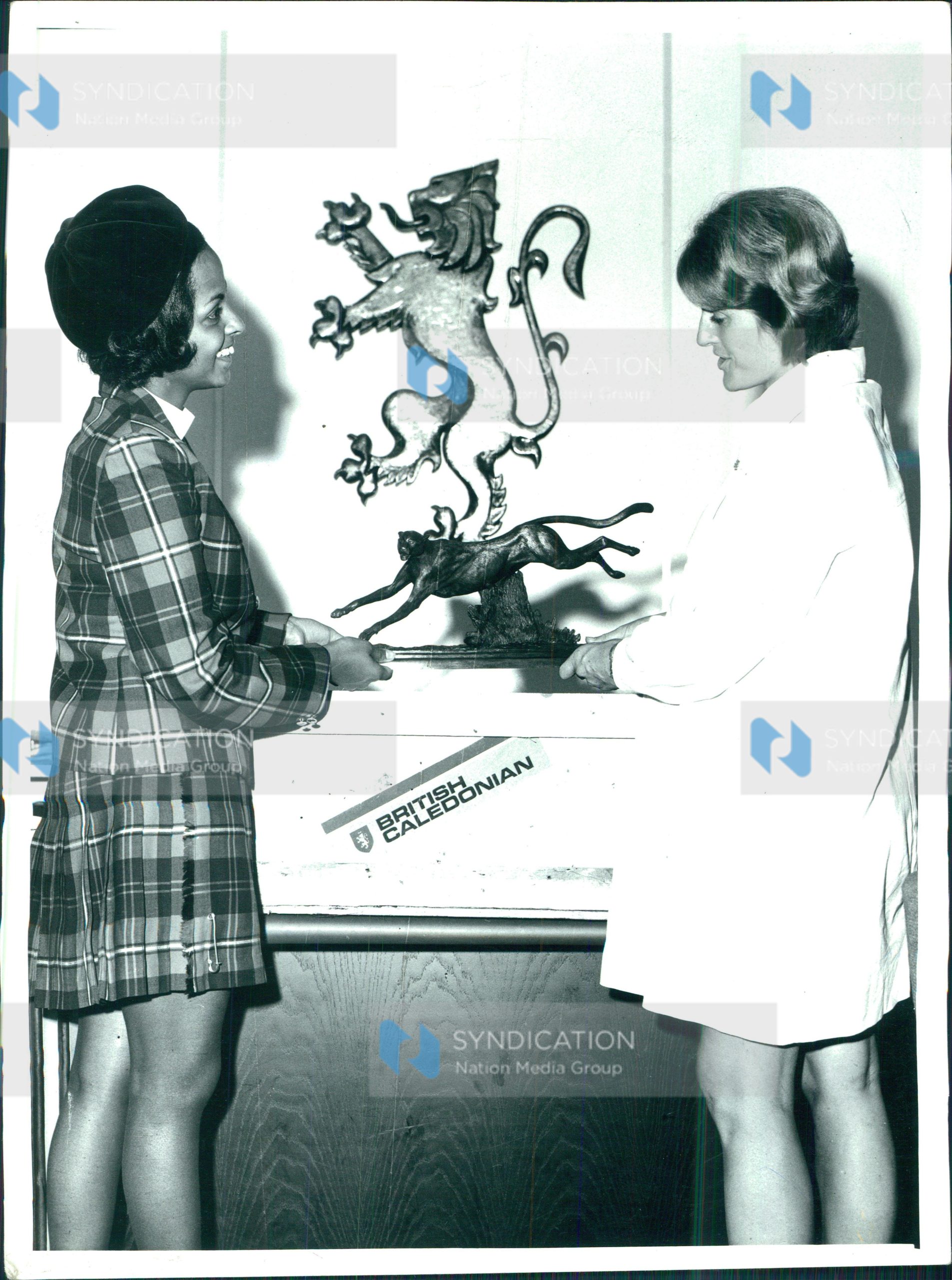 Mrs. Julia Glen, the sculptor’s wife, and Mrs. Hazel Seal of British Caledonian Airways