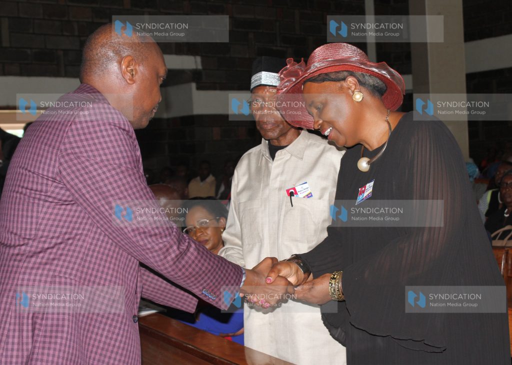 Jubilee Party Secretary General Jeremiah Kioni comforts former Subukia MP Koigi Wamwere and his wife Nduta Wamwere