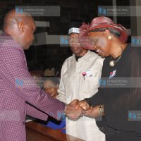 Jubilee Party Secretary General Jeremiah Kioni comforts former Subukia MP Koigi Wamwere and his wife Nduta Wamwere