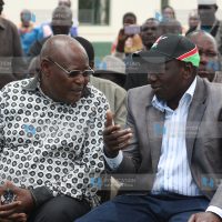 Former Speaker Francis Ole Kaparo chats with William Ruto
