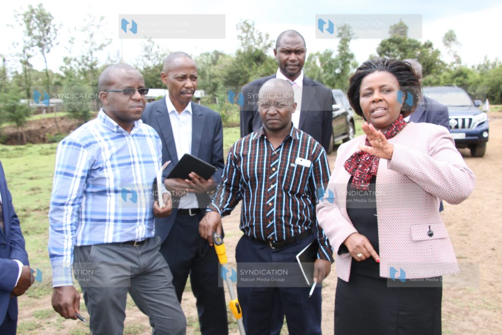 Bomet Governor Joyce Laboso tours the airstrip with officers from the Kenya Airports Authority (KAA)