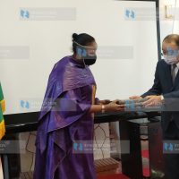 Sports Cabinet Secretary Amina Mohamed receives a gift from Yasuto Motomura, the chairman of the Kurume Chamber of Commerce and Industry