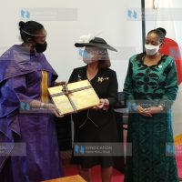 Sports Cabinet Secretary Amina Mohamed hands over a gift to U.S.E. Company Limited Chairman Kyoko Yoshihiro