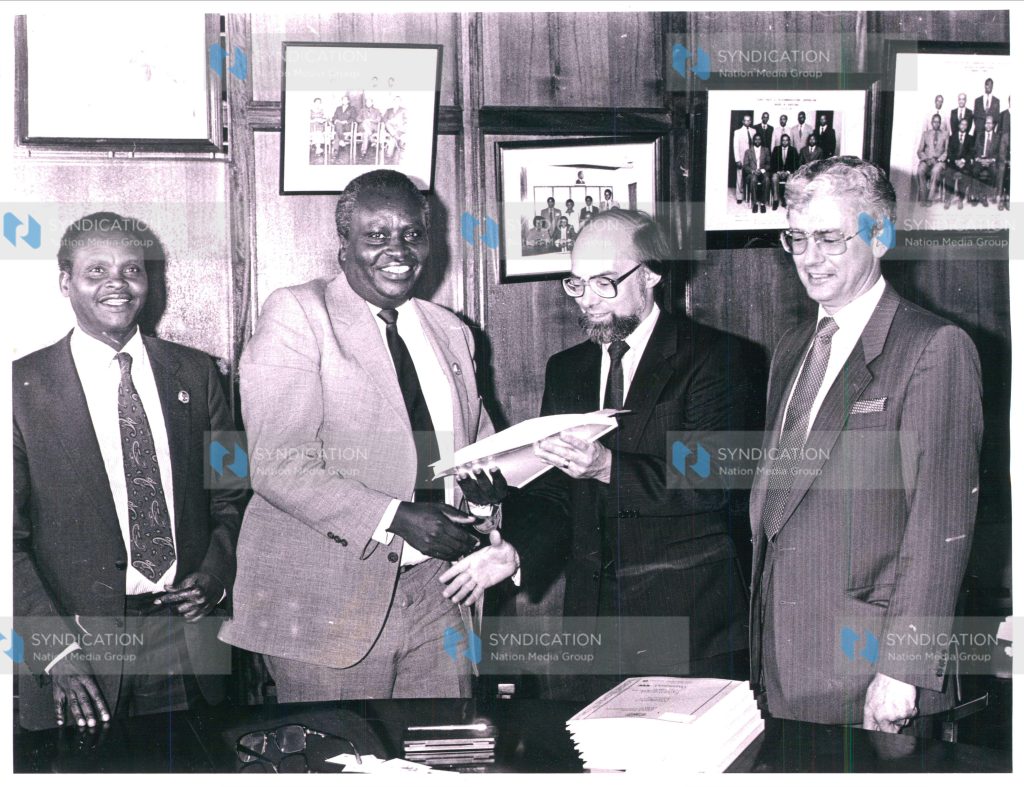 The chairman of the Kenya Posts and Telecommunications Corporation, Mr. J. N. Kariuki, and Mr. Mike. Peace, general manager of British Telconsult