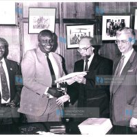 The chairman of the Kenya Posts and Telecommunications Corporation, Mr. J. N. Kariuki, and Mr. Mike. Peace, general manager of British Telconsult