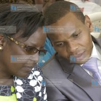 Gender and Children affairs minister Esther Murugi chats with medical assistant minister Danson Mungatana