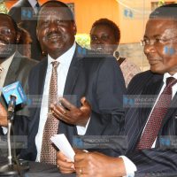 Raila Odinga (centre) flanked by former Speaker of the National Assembly Kenneth Marende (right)