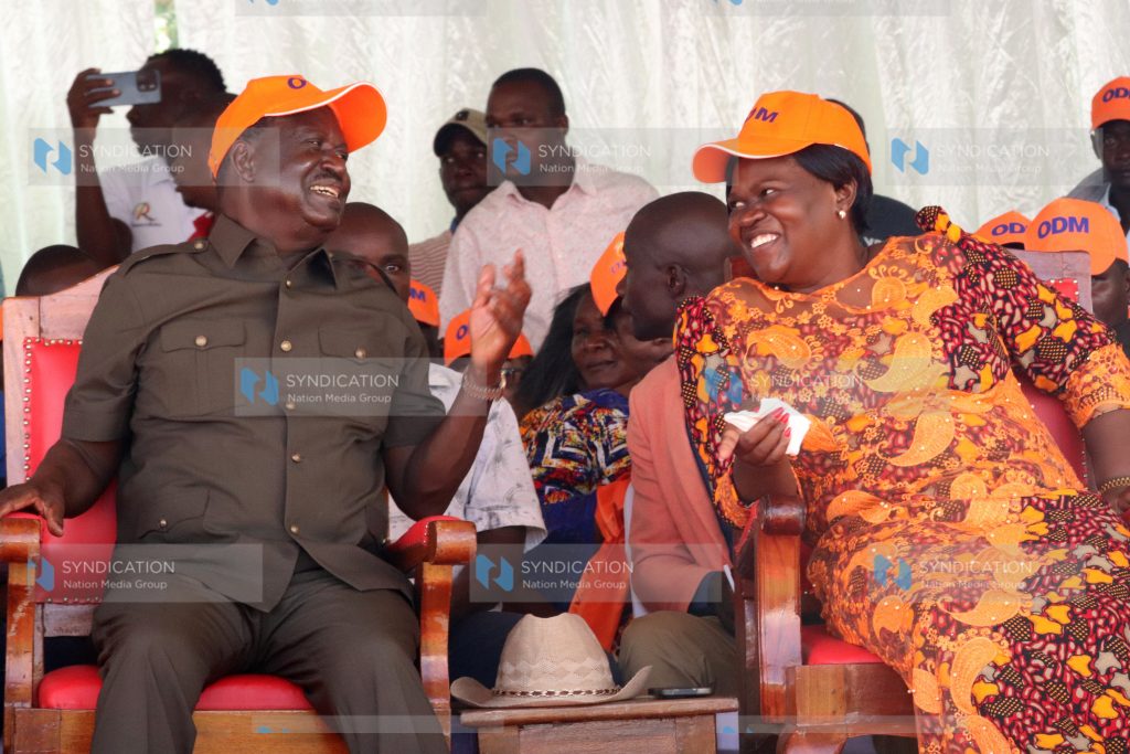 ODM leader Raila Odinga converse with Homa Bay Governor Gladys Wanga