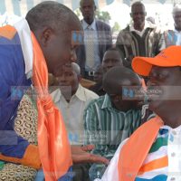 Cord alliance presidential candidate Raila Odinga consults with former Mp Mr Omingo Magara