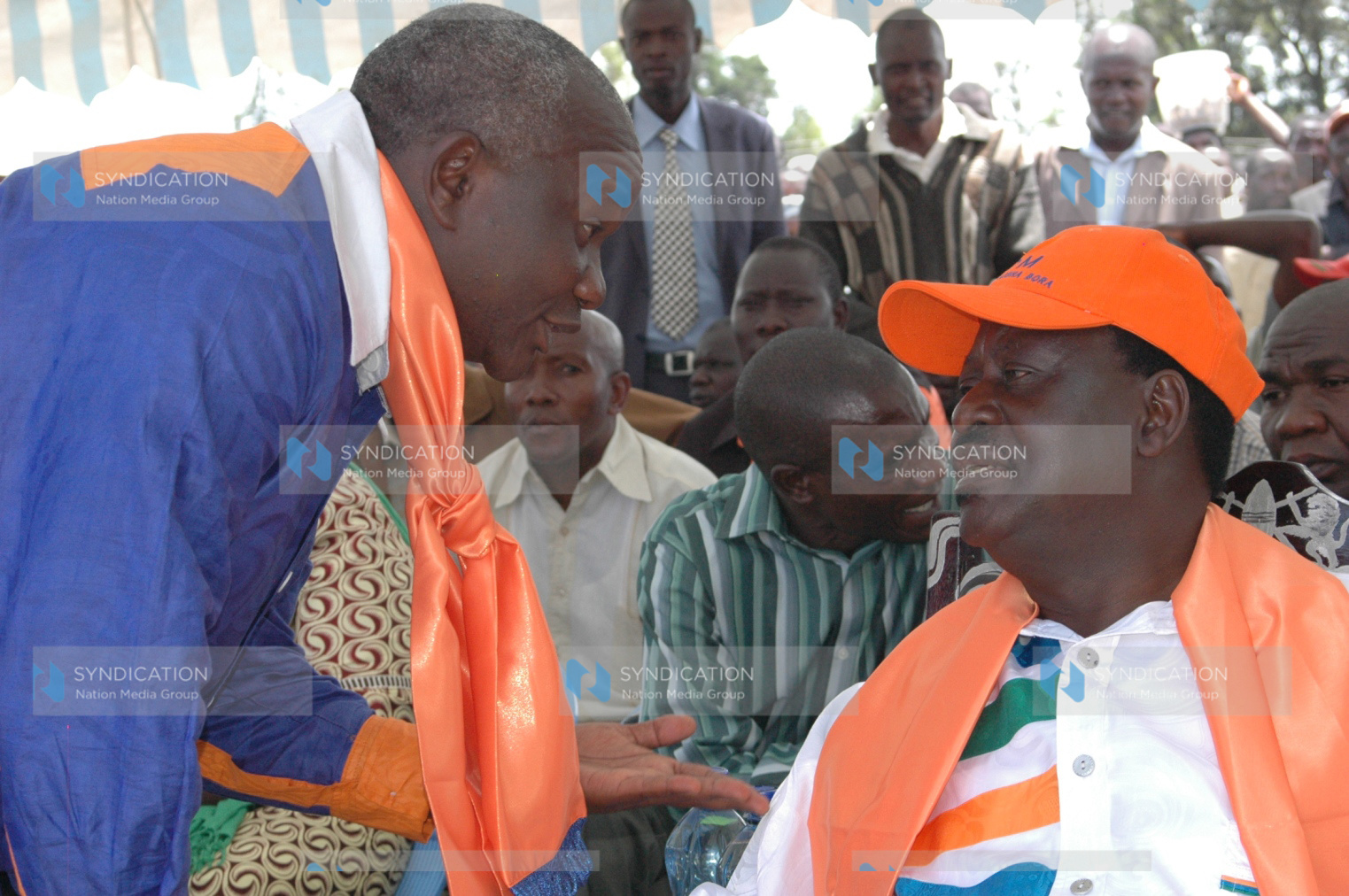 Cord alliance presidential candidate Raila Odinga consults with former Mp Mr Omingo Magara