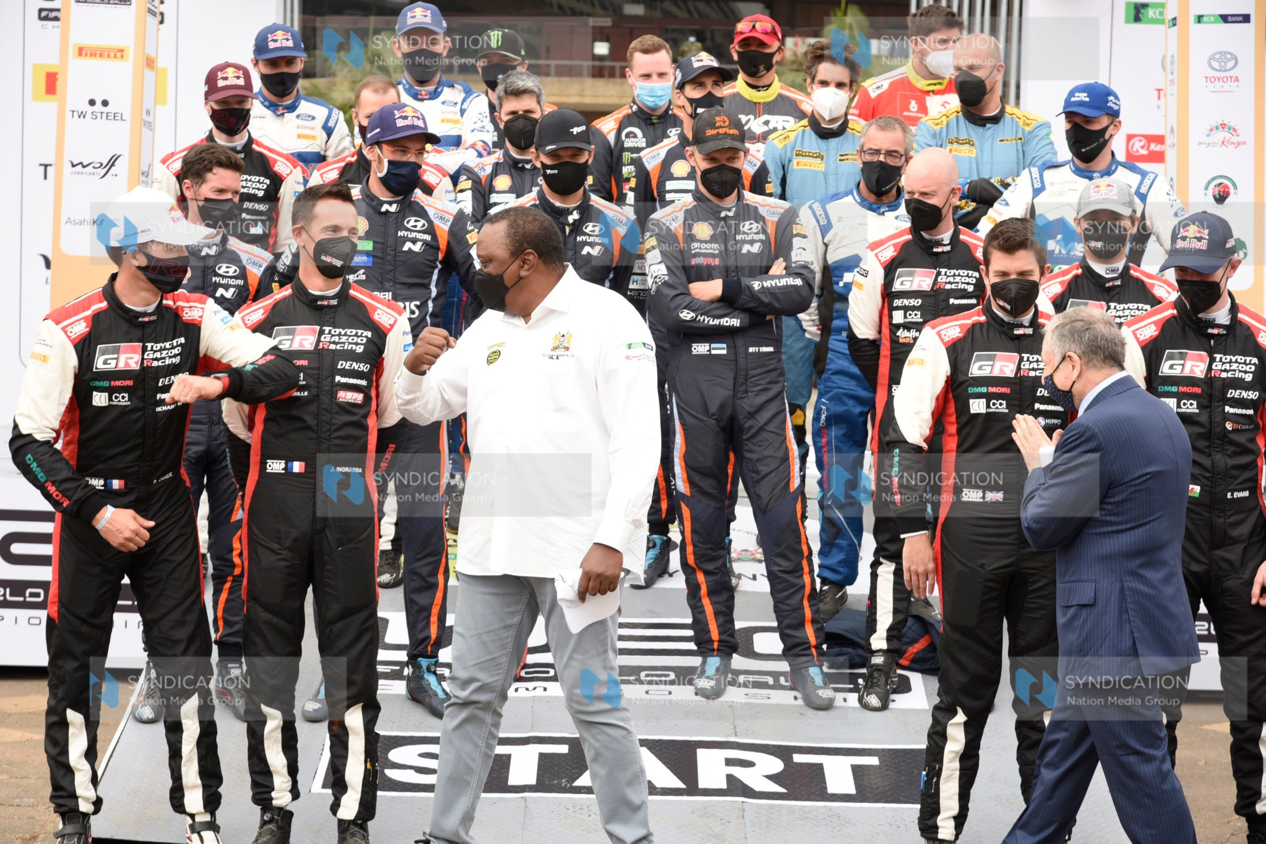 President Uhuru Kenyatta and International Automobile Federation President Jean Todt with World Rally Championship drivers