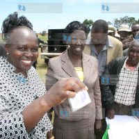Eldoret East MP Prof. Margaret Kamar displays her new voter’s card