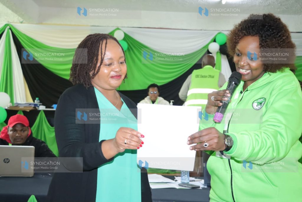 Kirinyaga Governor Anne Waiguru receives her election certificate from County Elections Manager Jane Gitonga