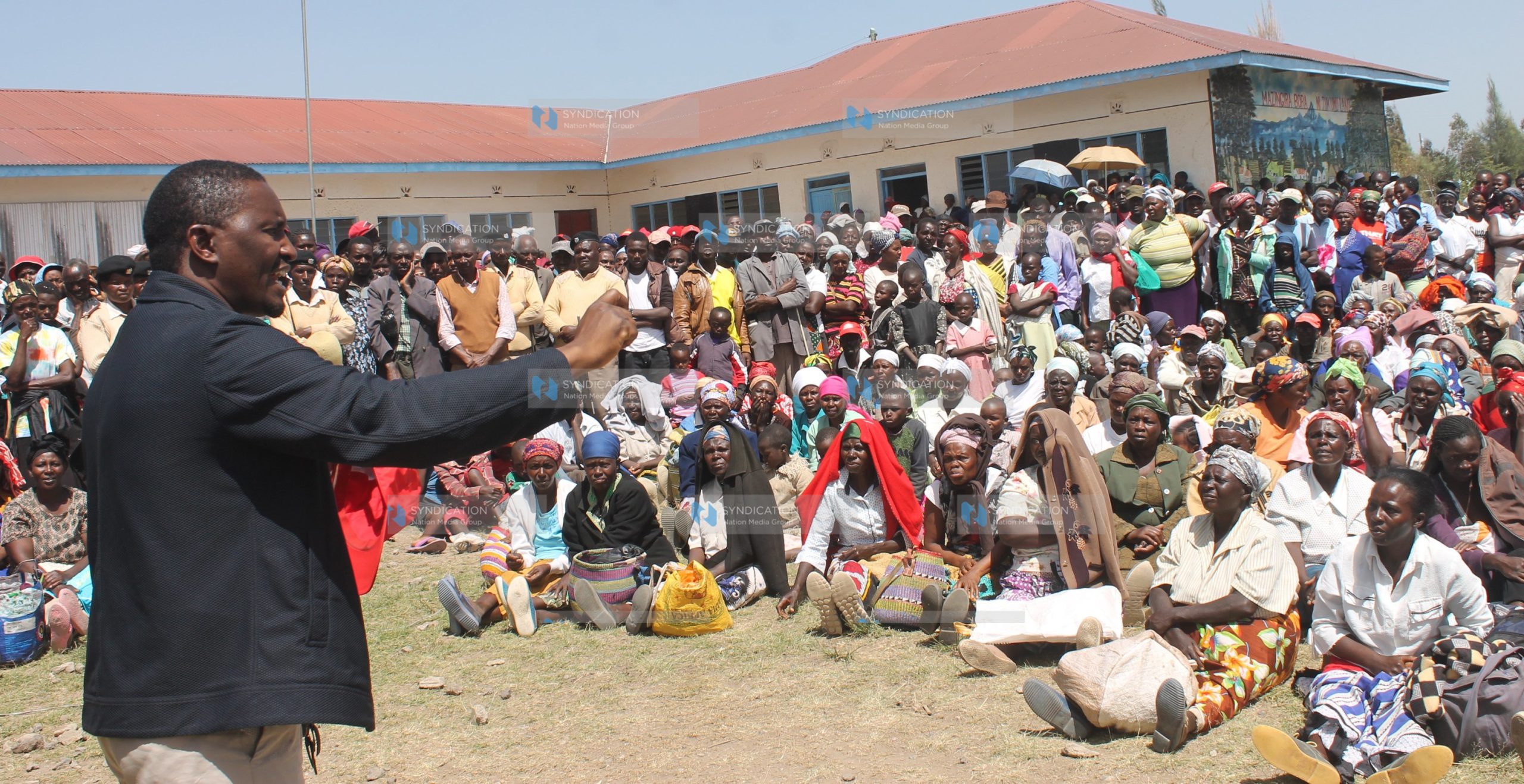 Cabinet Secretary Mwangi Kiunjuri addresses residents of Wiyumiririe Village