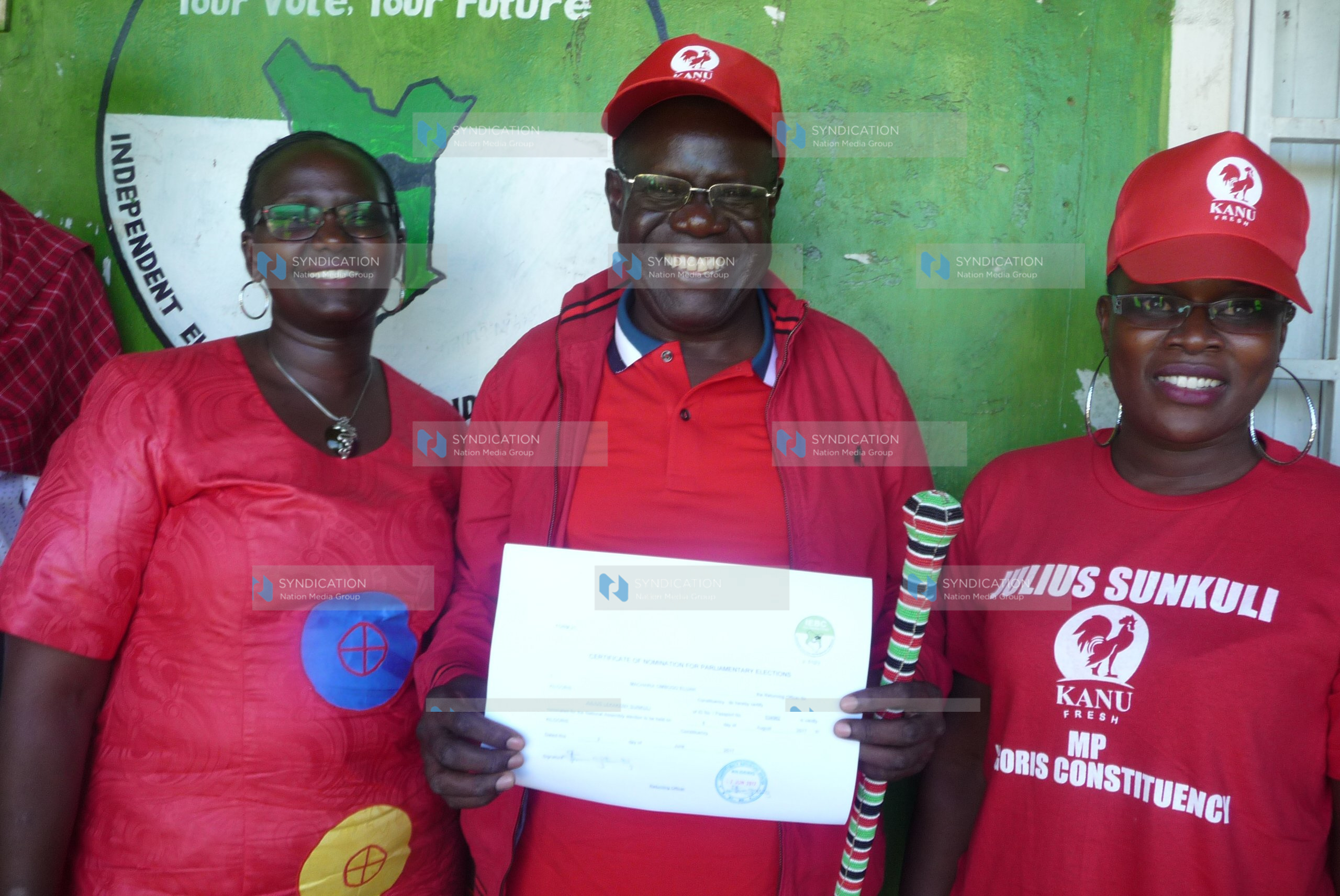 Julius Sunkuli displays his nomination certificate